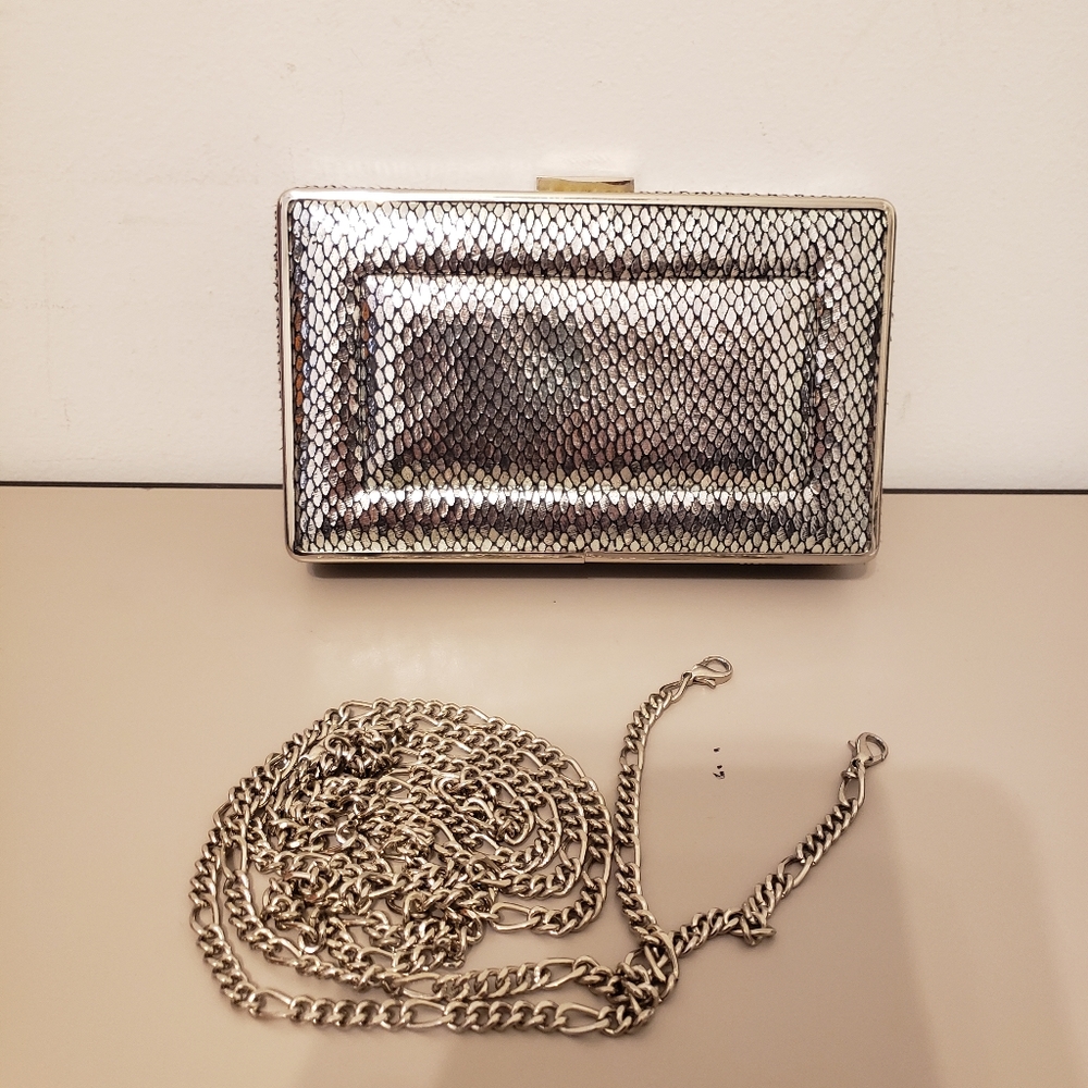 WHITE/HOUSE/BLACK/MARKET  chain/multi lengths 6.5" wide 4"tall clutch 25.00 OFF